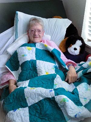 Debbie with her ALS quilt!